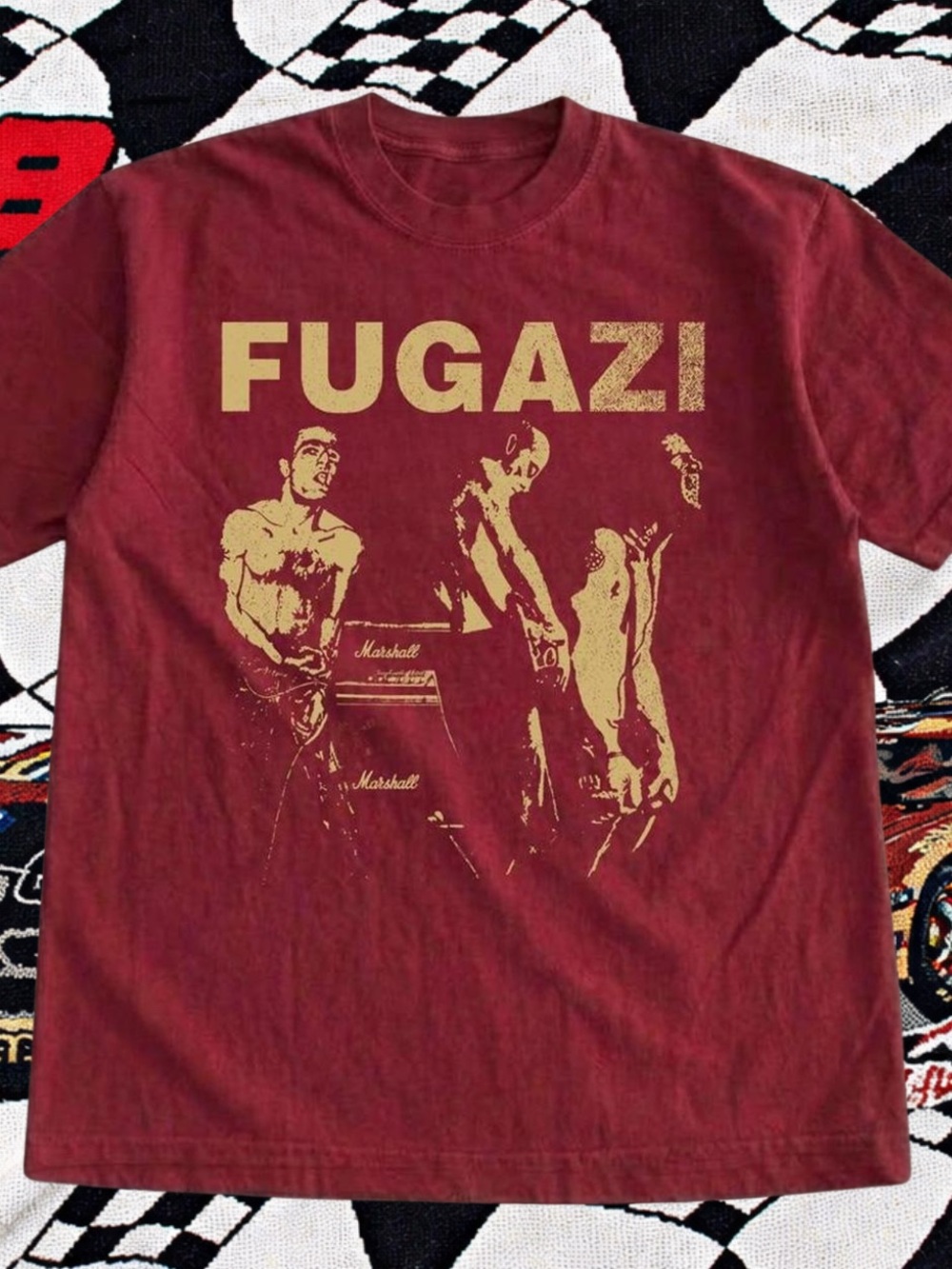 Gildan Men's Burgundy Tee with Gold Fugazi Graphic